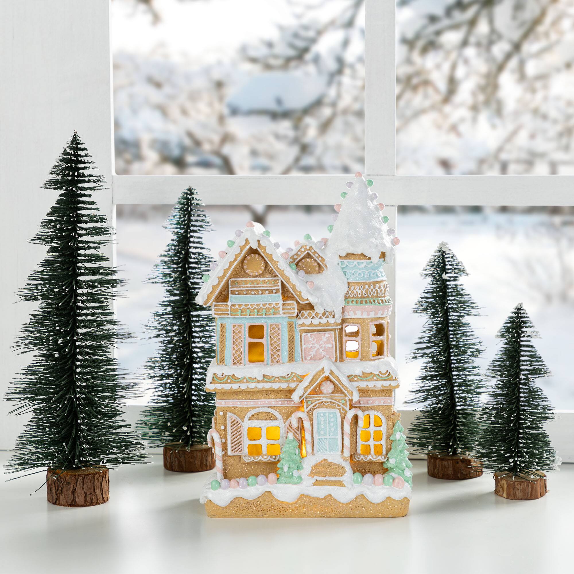 Glitzhome® 11.75" Christmas Macaron Resin Village Table Decor